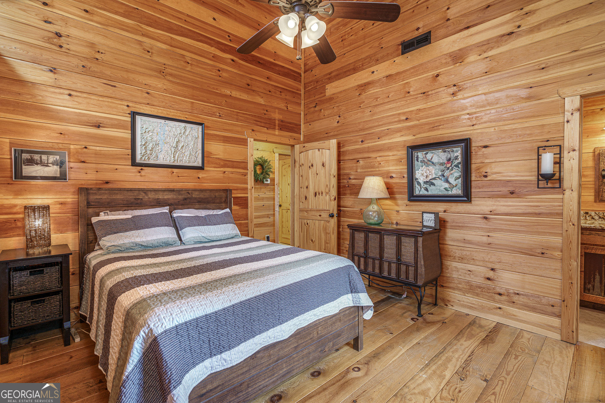 60 Silver Fox Circle Murphy, NC 28906 - Photo 20 of 48 a bedroom with a bed and a ceiling fan