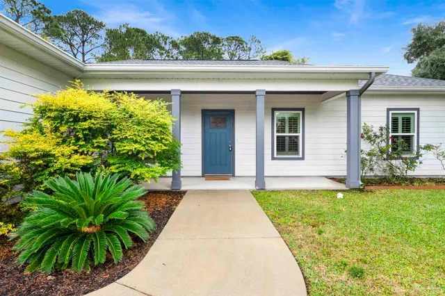 a bathroom with a sink and a large window