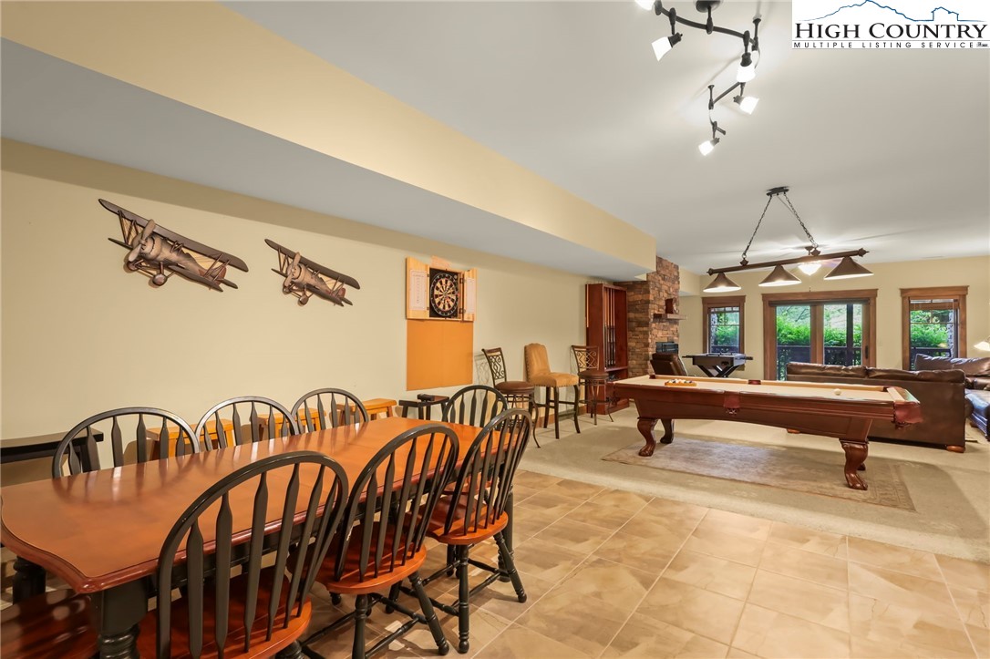 138 South Camp Road, Unit 103 Boone, NC 28607 - Photo 29 of 50 a view of a dining room with furniture