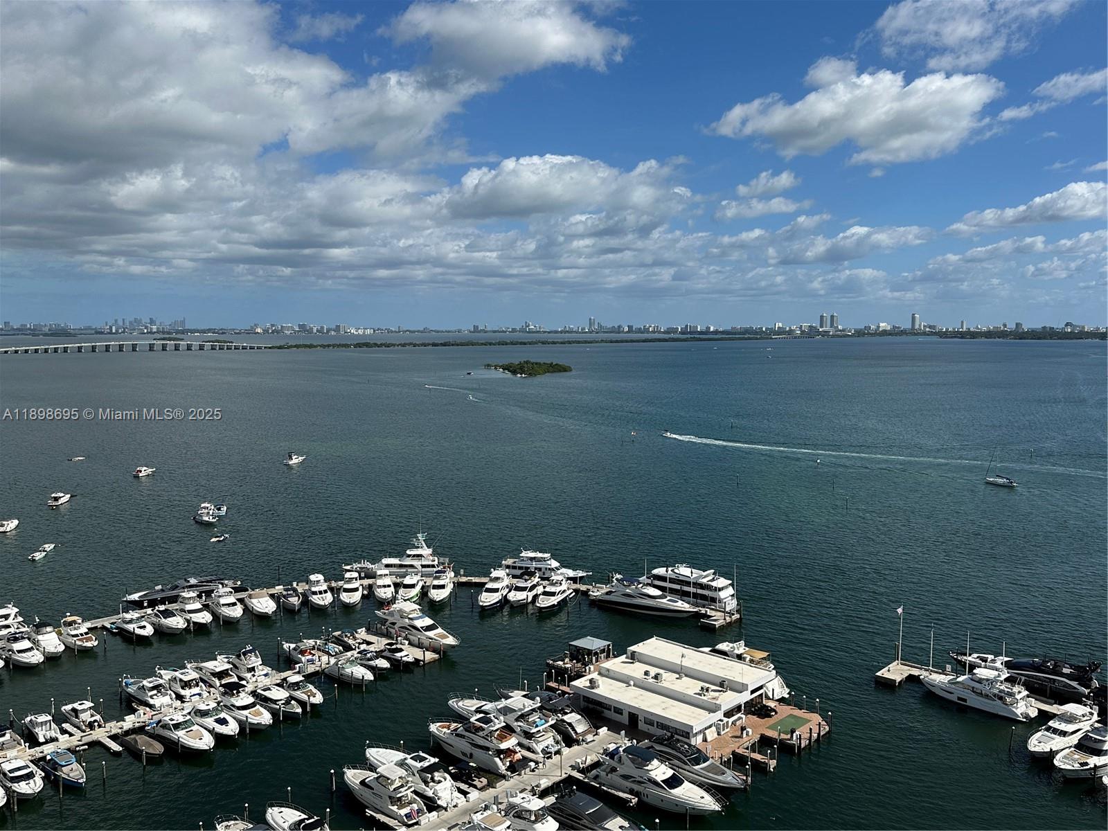 555 Northeast 15th Street, Unit 23B Miami, FL 33132 - Photo 10 of 32 a view of a lake with a car