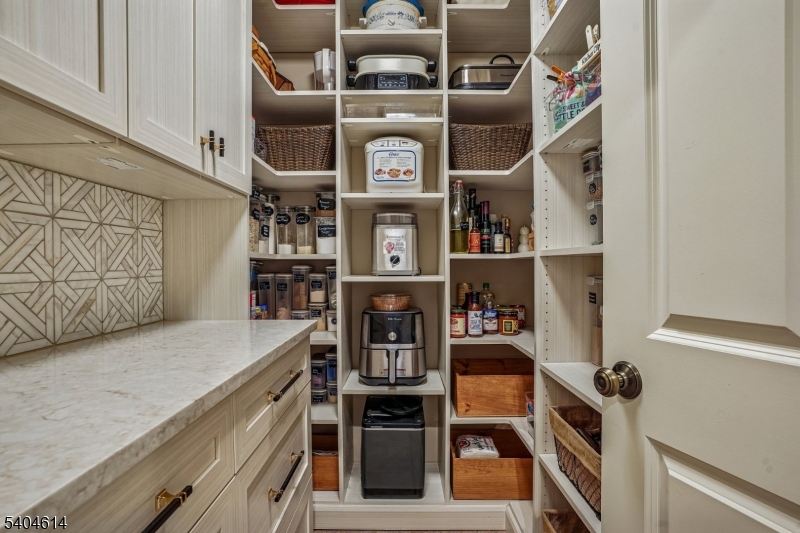 36 West Springtown Road Long Valley, NJ 07853 - Photo 16 of 50 a view of walk in closet with clothes and shoes