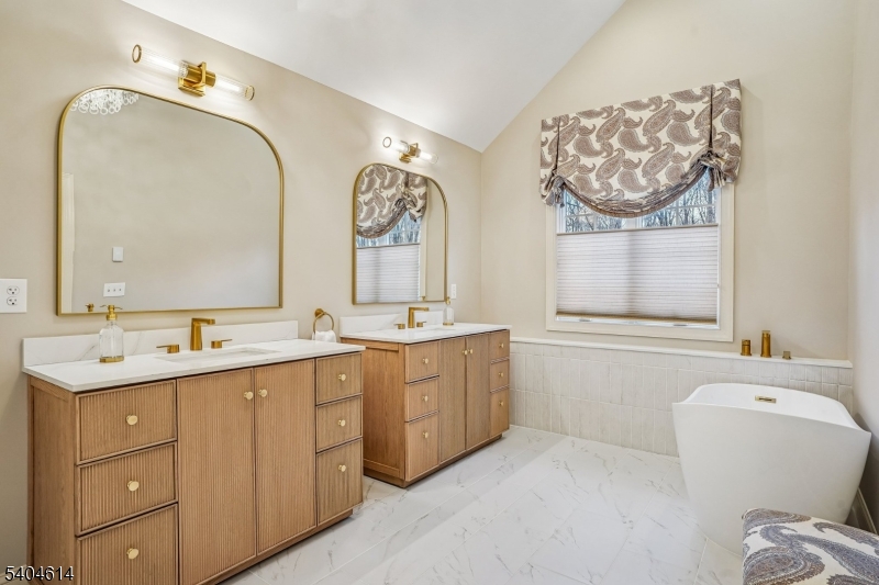 36 West Springtown Road Long Valley, NJ 07853 - Photo 26 of 50 a bathroom with a double vanity sink and a mirror