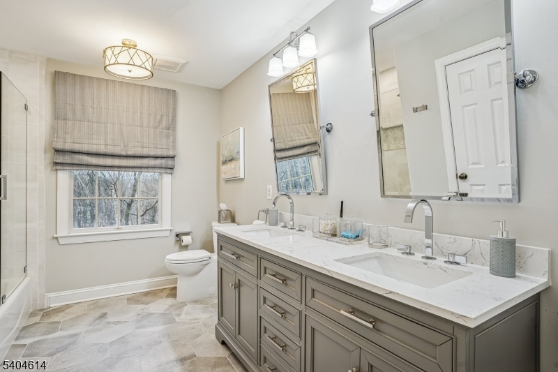 36 West Springtown Road Long Valley, NJ 07853 - Photo 29 of 50 a bathroom with a sink toilet and shower