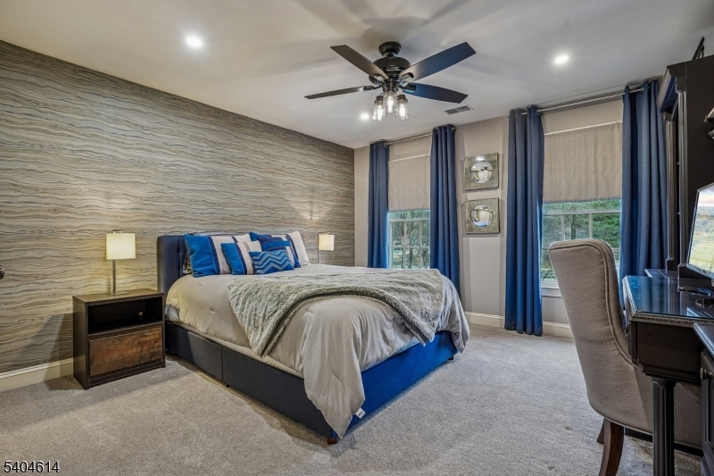 36 West Springtown Road Long Valley, NJ 07853 - Photo 30 of 50 a spacious bedroom with a bed and a chandelier