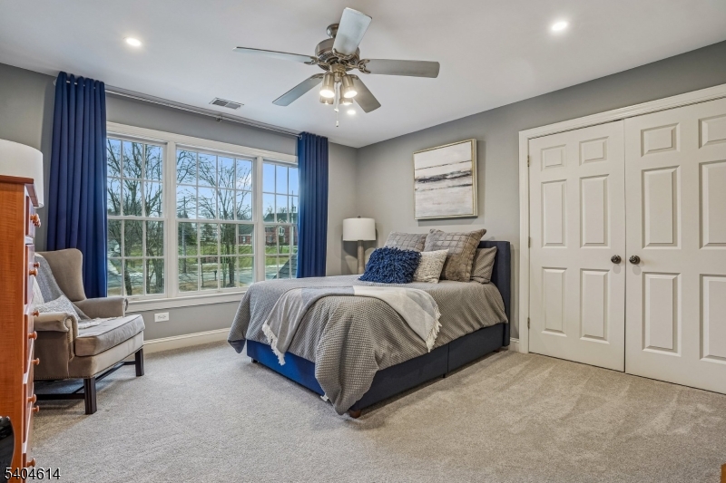 36 West Springtown Road Long Valley, NJ 07853 - Photo 31 of 50 a spacious bedroom with a bed and a couch