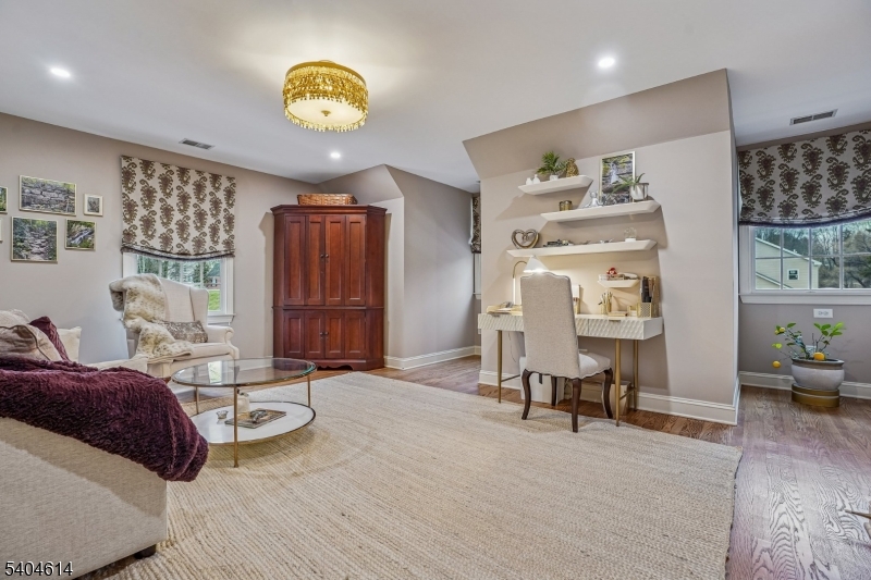 36 West Springtown Road Long Valley, NJ 07853 - Photo 33 of 50 a living room with furniture and a lamp