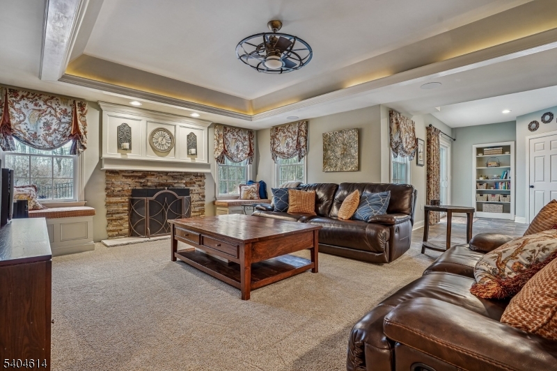 36 West Springtown Road Long Valley, NJ 07853 - Photo 38 of 50 a living room with furniture and a fireplace