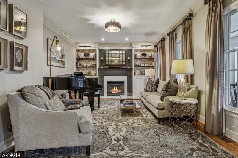 36 West Springtown Road Long Valley, NJ 07853 - Photo 9 of 50 a living room with furniture a large window and a fireplace