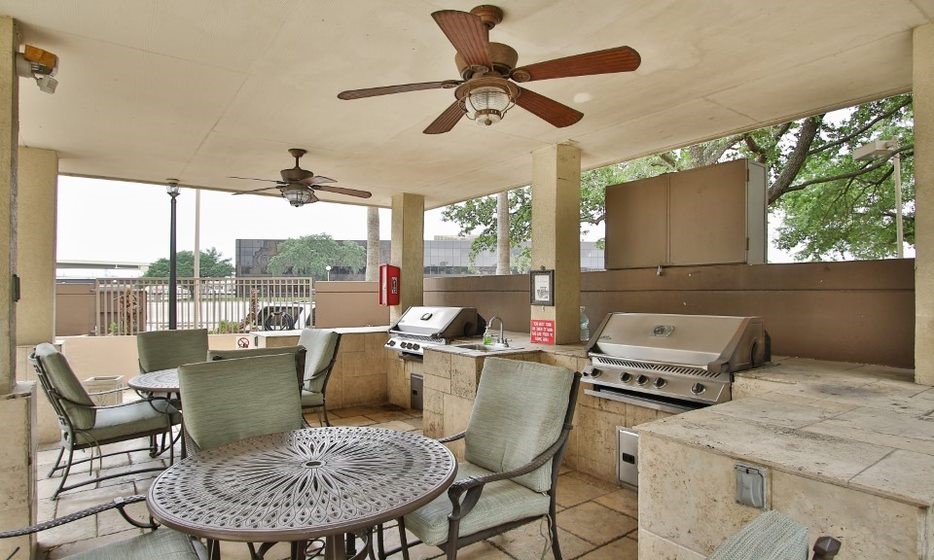 3525 Sage Road, Unit 318 Houston, TX 77056 - Photo 15 of 46 a view of a dining room with furniture window and outside view
