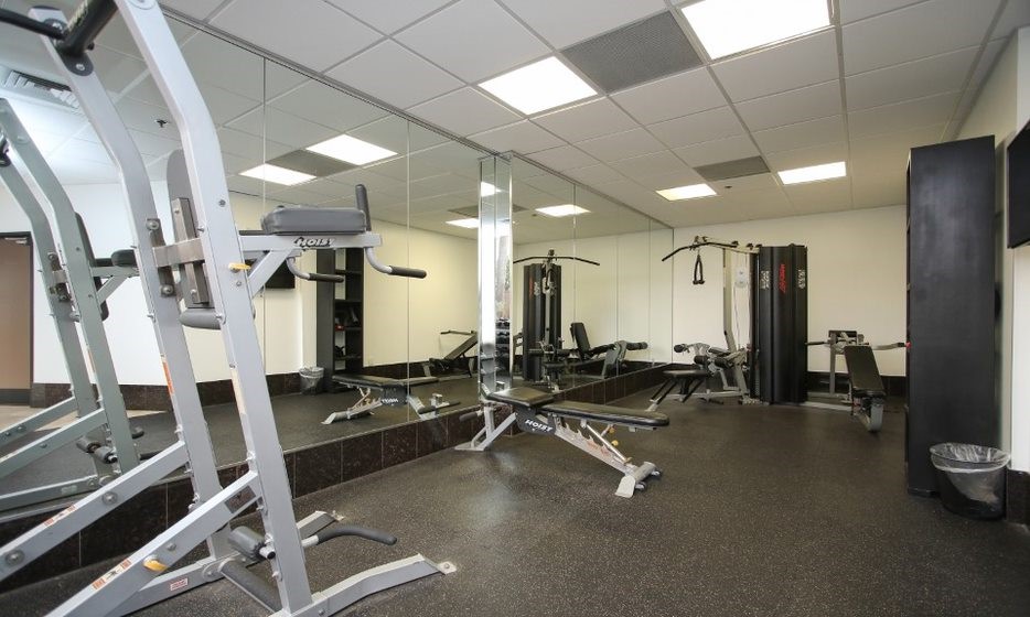 3525 Sage Road, Unit 318 Houston, TX 77056 - Photo 20 of 46 a view of a room with gym equipment