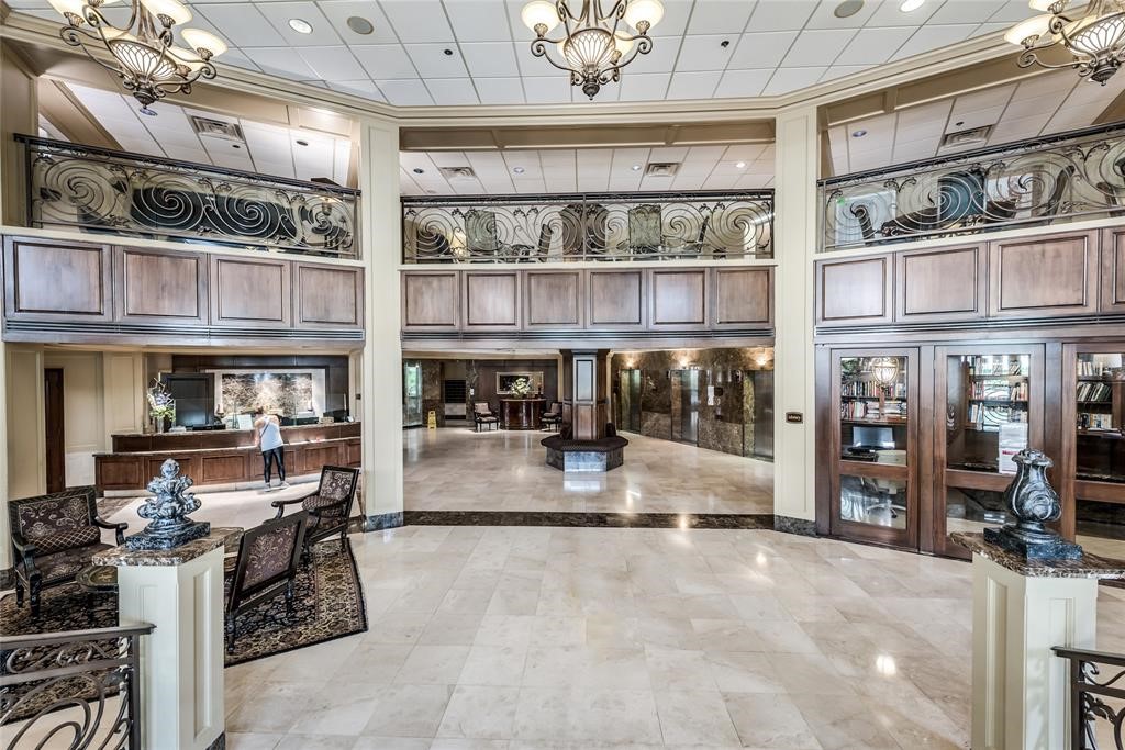 3525 Sage Road, Unit 318 Houston, TX 77056 - Photo 3 of 46 a kitchen with stainless steel appliances granite countertop a stove and cabinets