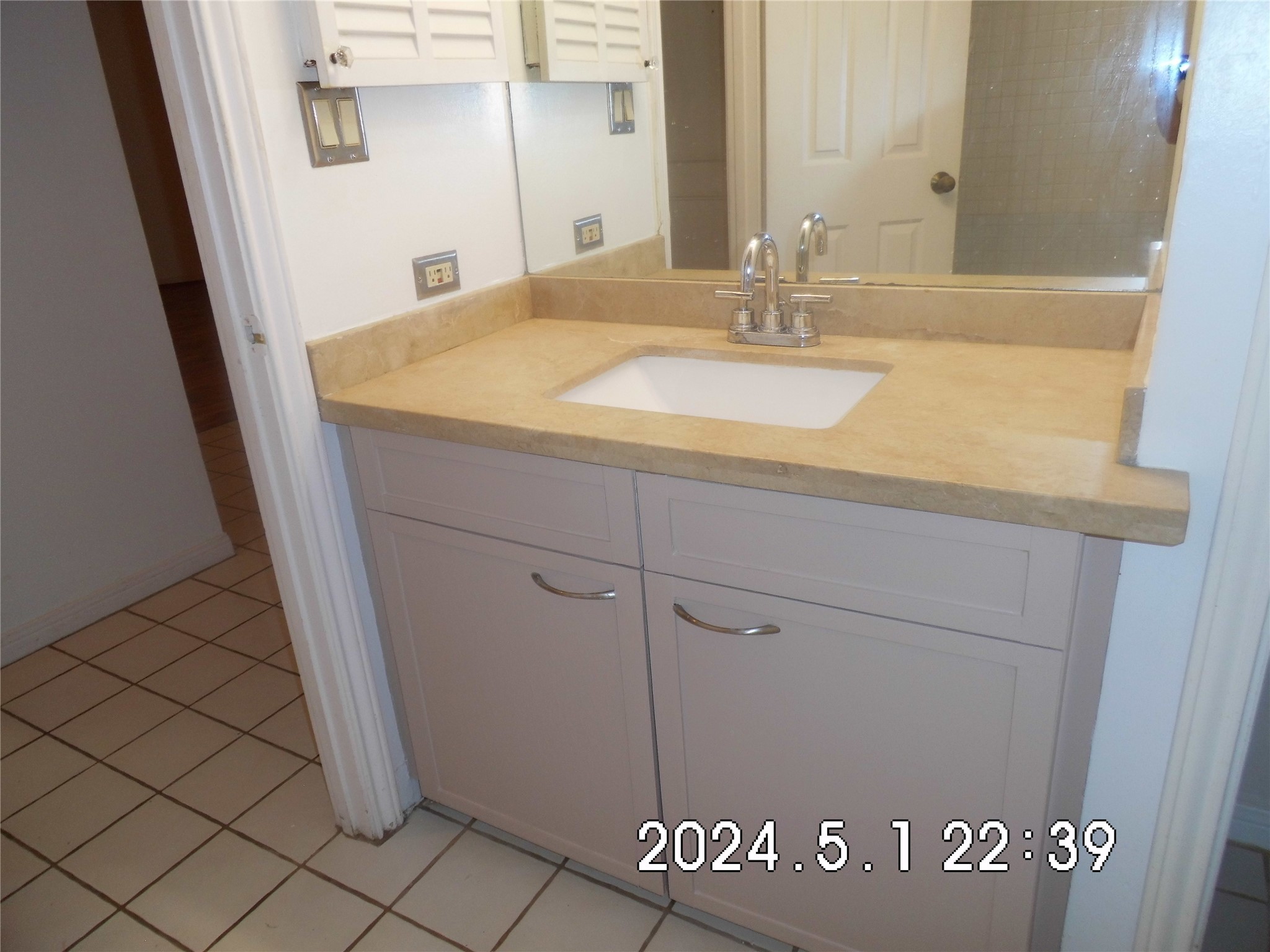3525 Sage Road, Unit 318 Houston, TX 77056 - Photo 31 of 46 a bathroom with a sink and a mirror