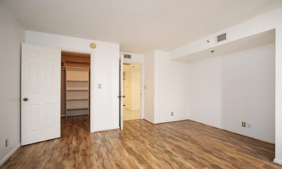 3525 Sage Road, Unit 318 Houston, TX 77056 - Photo 41 of 46 wooden floor in an empty room