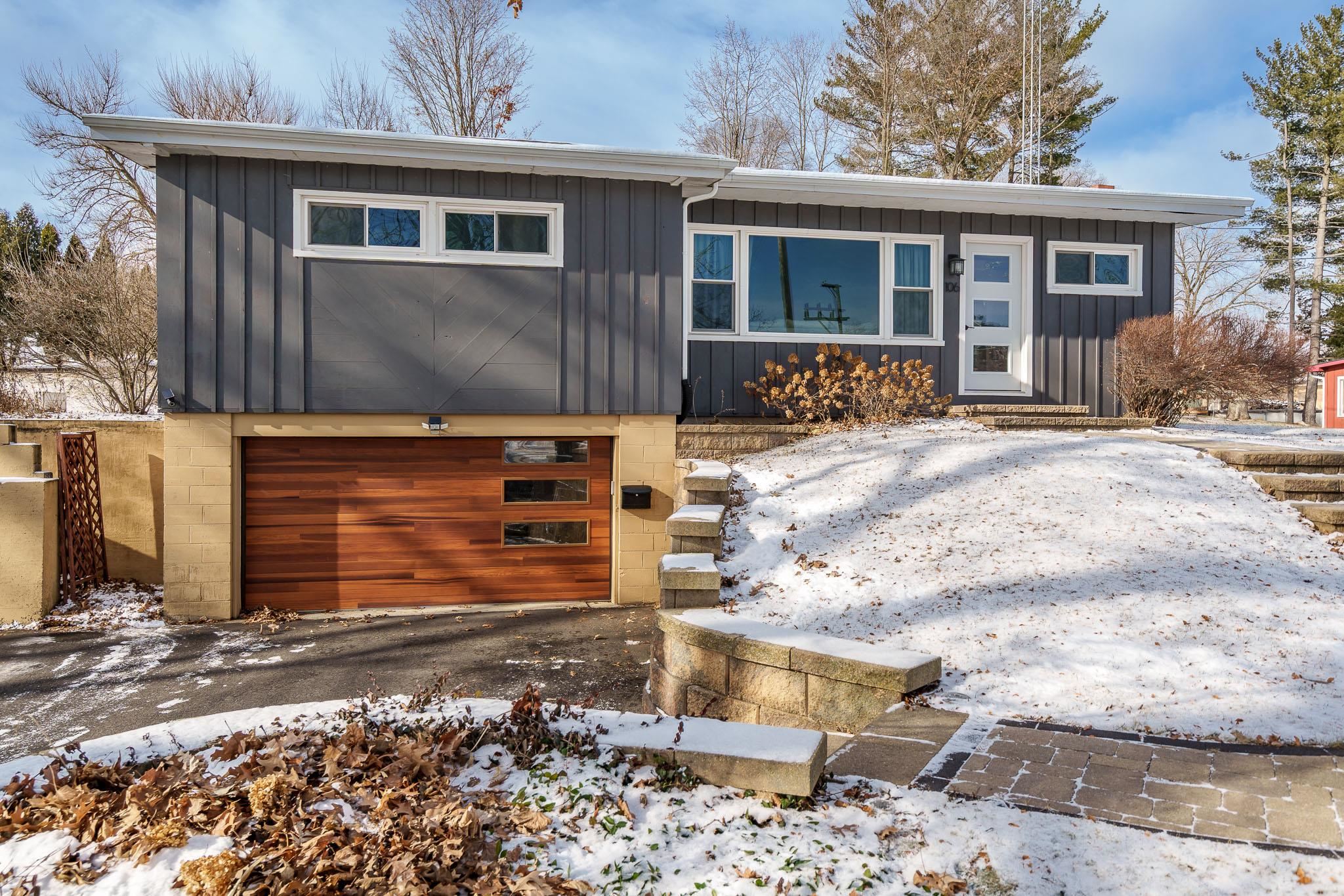 106 Mix Street Oregon, IL 61061 - Photo 17 of 49 a front view of a house with garden