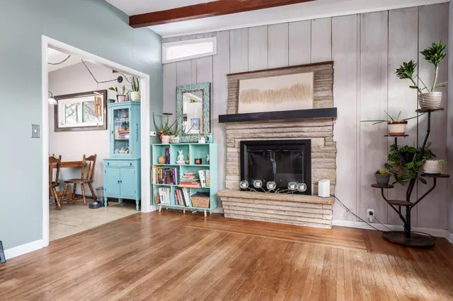 a kitchen that has a sink and a stove in it