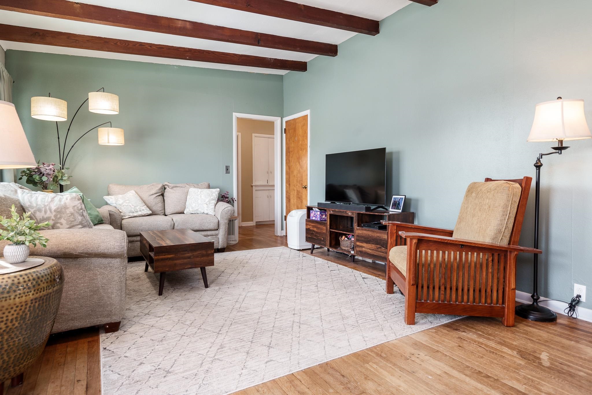 106 Mix Street Oregon, IL 61061 - Photo 27 of 49 a living room with furniture and a flat screen tv