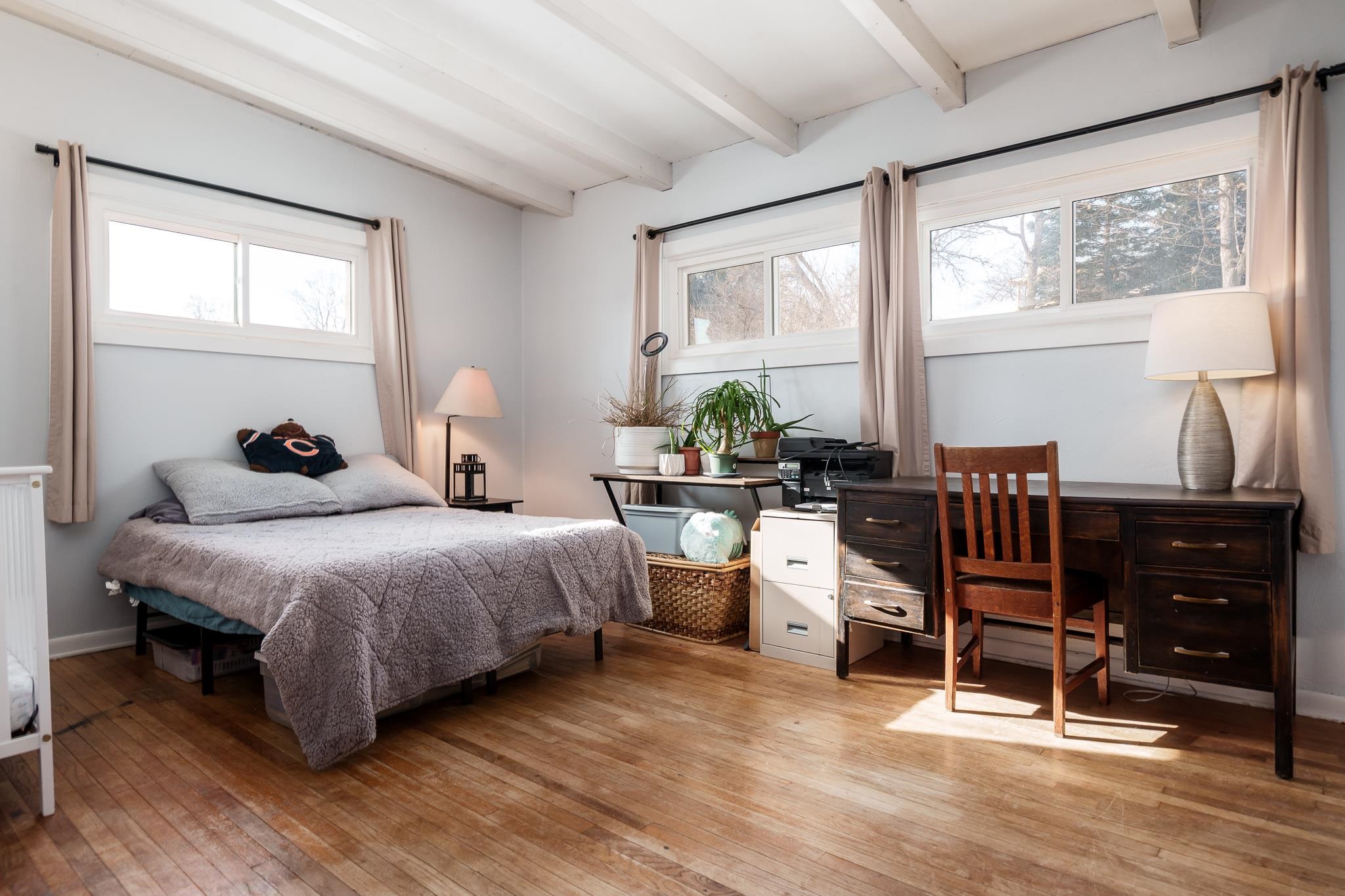 106 Mix Street Oregon, IL 61061 - Photo 34 of 49 a bedroom with a bed and a large window