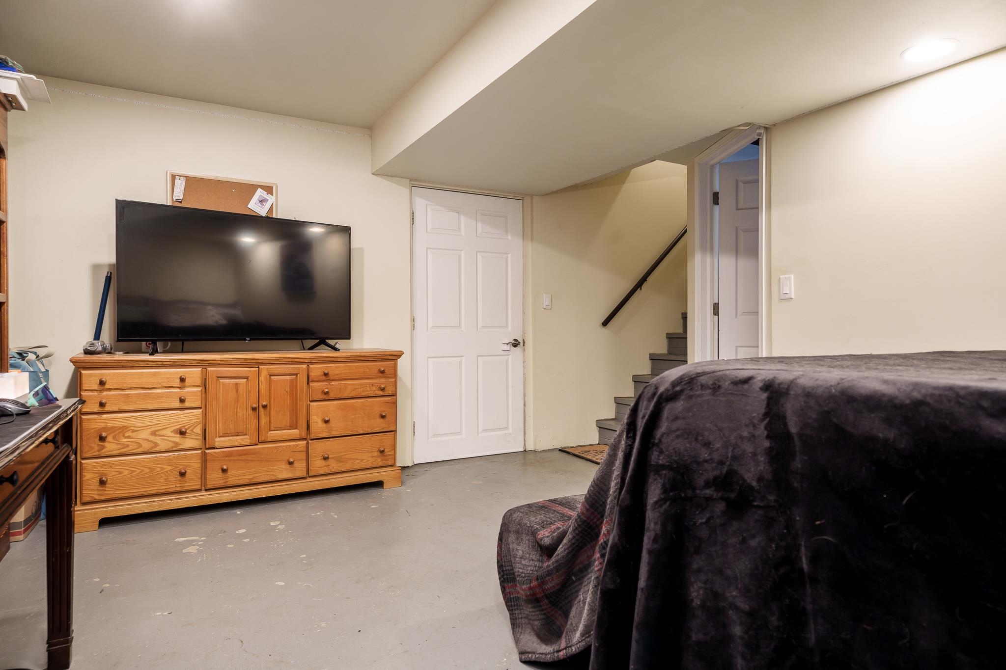 106 Mix Street Oregon, IL 61061 - Photo 37 of 49 a room with furniture and flat screen tv