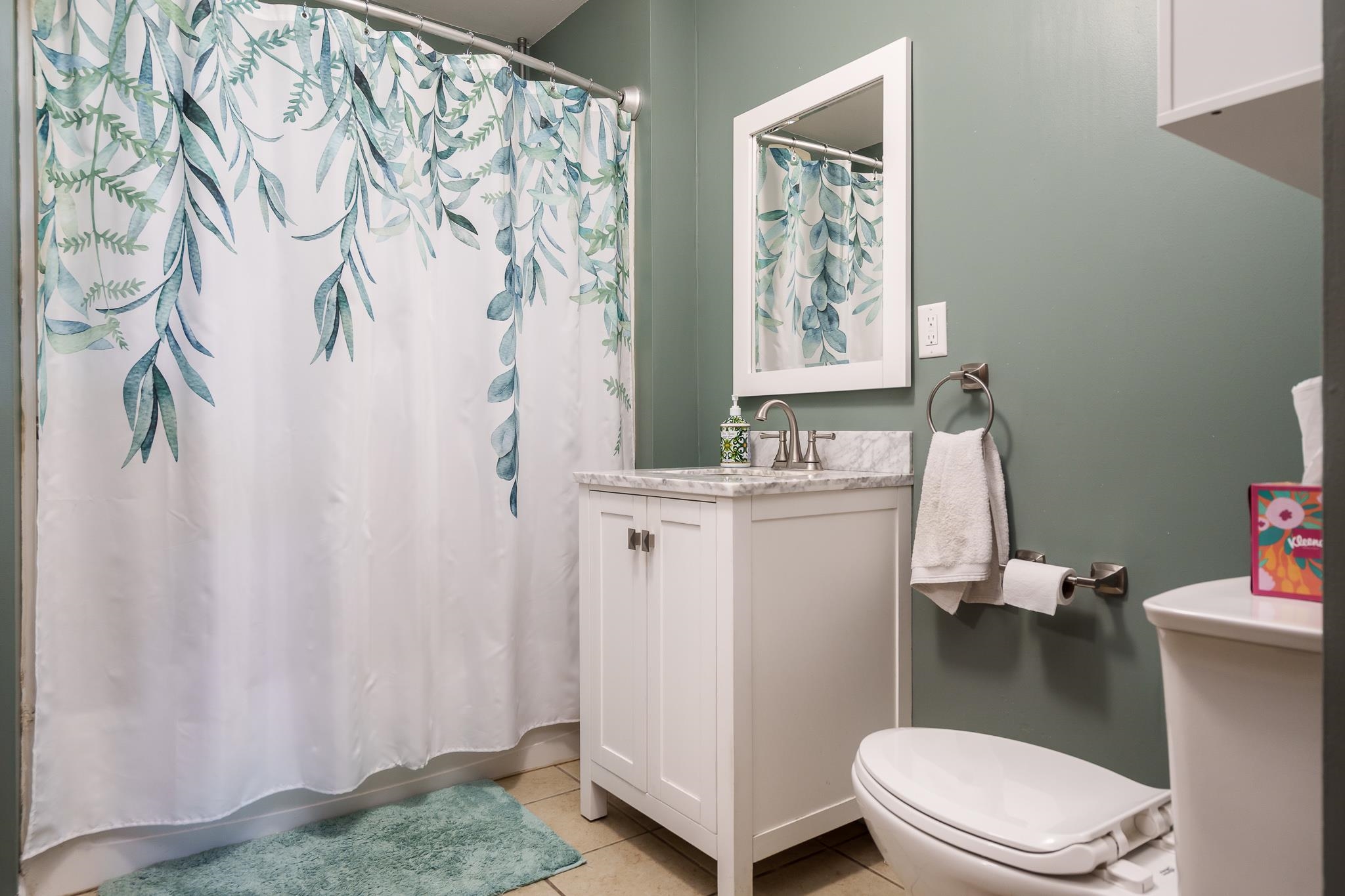 106 Mix Street Oregon, IL 61061 - Photo 39 of 49 a bathroom with a sink toilet and shower