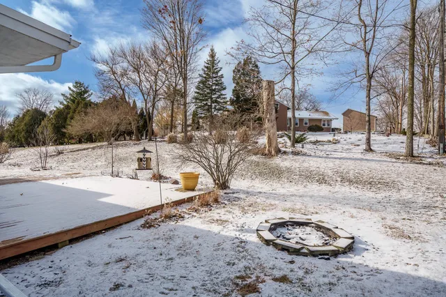 a house with a bench in front of it