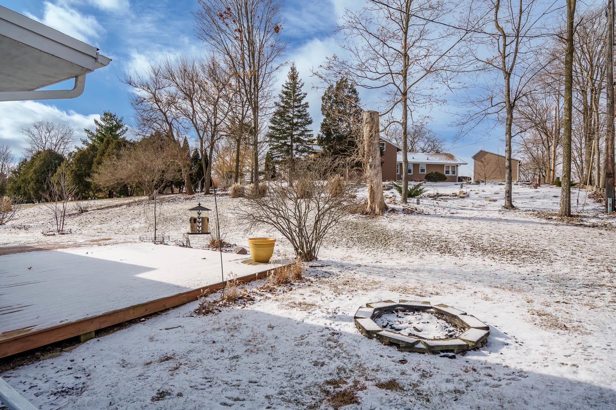 106 Mix Street Oregon, IL 61061 - Photo 8 of 49 a view of a backyard of the house