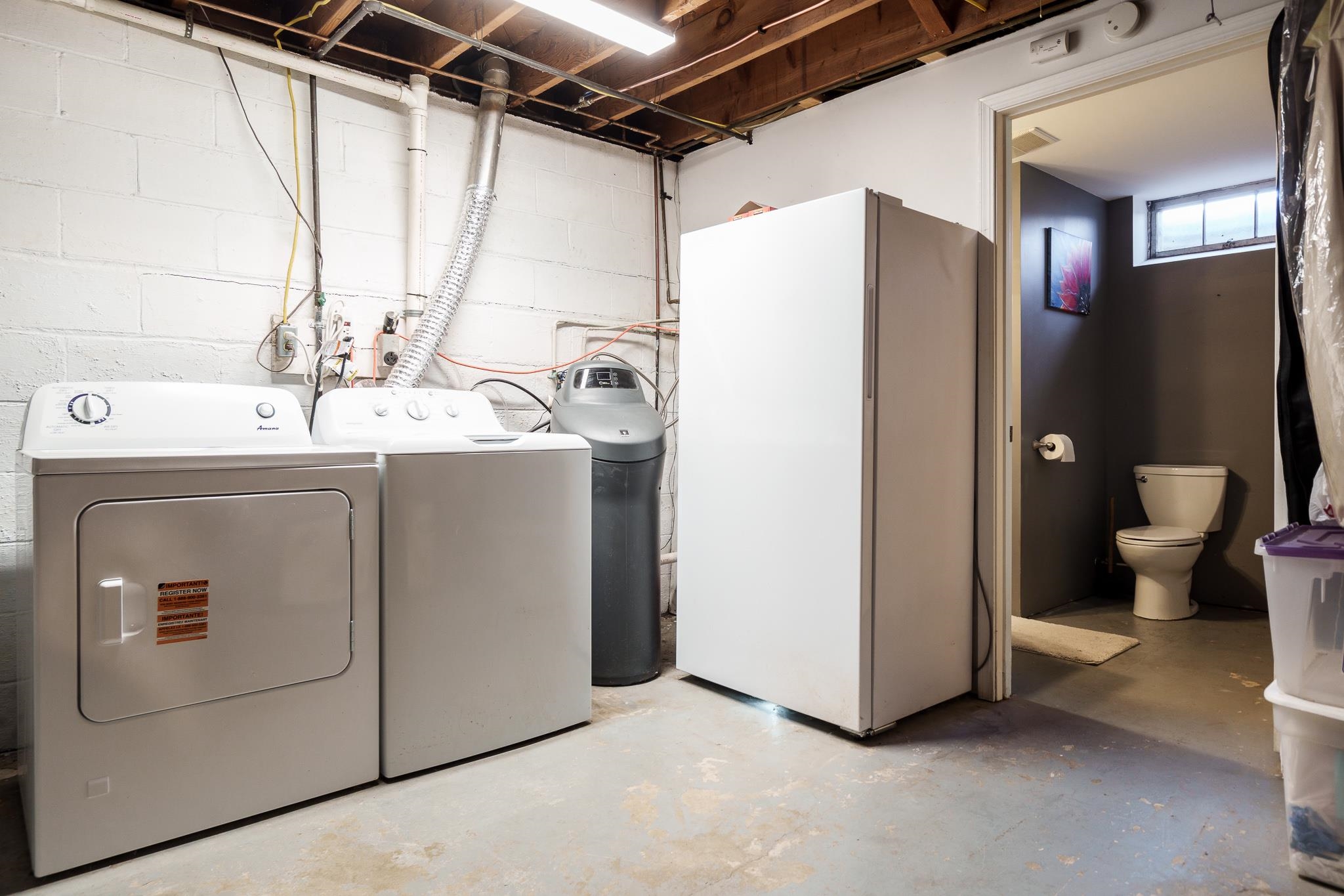 106 Mix Street Oregon, IL 61061 - Photo 9 of 49 a view of a storage and utility room with a sink