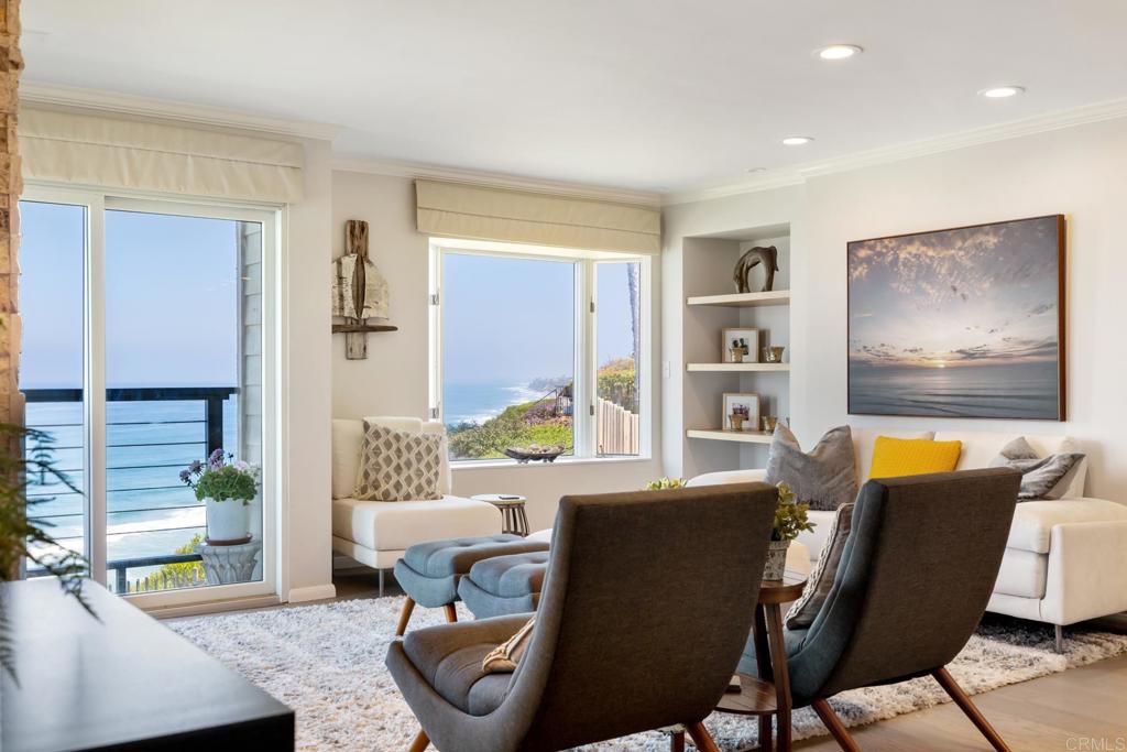 940 Sealane Drive, Unit 14 Encinitas, CA 92024 - Photo 13 of 45 a living room with furniture and a window