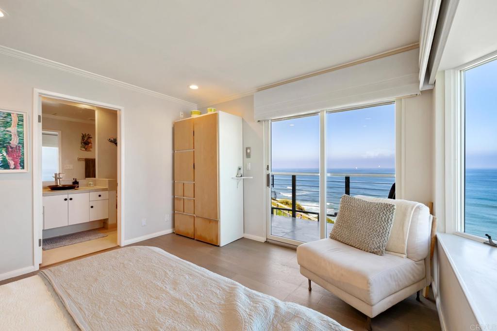 940 Sealane Drive, Unit 14 Encinitas, CA 92024 - Photo 17 of 45 a living room with furniture and a walk in closet