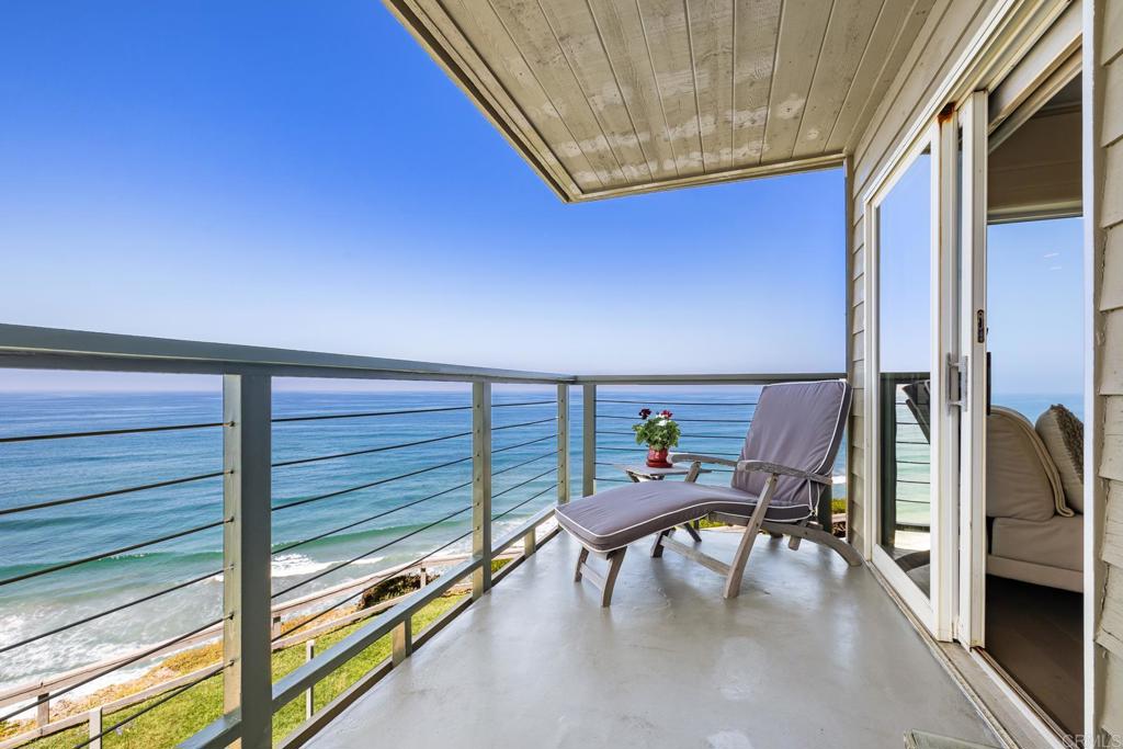 940 Sealane Drive, Unit 14 Encinitas, CA 92024 - Photo 20 of 45 a view of a chairs and table in the balcony