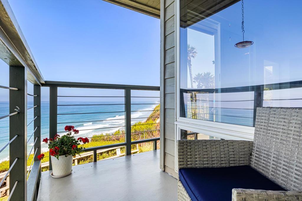940 Sealane Drive, Unit 14 Encinitas, CA 92024 - Photo 23 of 45 a view of a porch with a bench