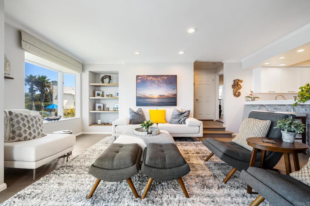 940 Sealane Drive, Unit 14 Encinitas, CA 92024 - Photo 25 of 45 a living room with furniture and a rug