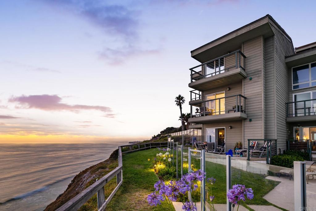 940 Sealane Drive, Unit 14 Encinitas, CA 92024 - Photo 36 of 45 a view of a house with a yard