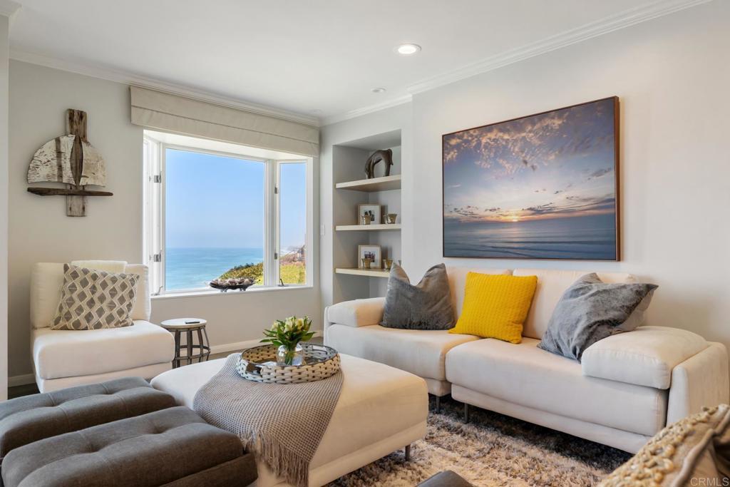 940 Sealane Drive, Unit 14 Encinitas, CA 92024 - Photo 4 of 45 a living room with furniture and a couch