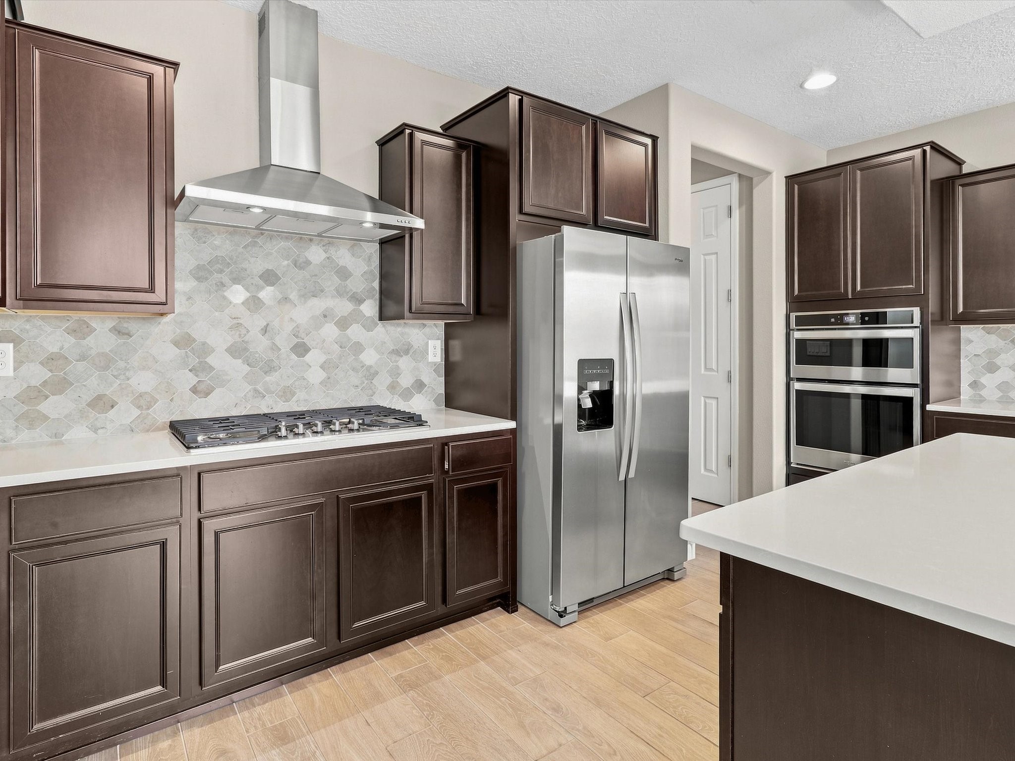 4642 Rail Runner Road Santa Fe, NM 87507 - Photo 16 of 74 Equipped with appliances and designed for functionality, this kitchen is ready for everyday living.