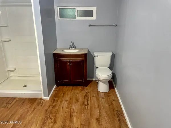 a view of balcony with wooden floor and wall