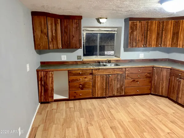 a bedroom with a bed and a bathroom