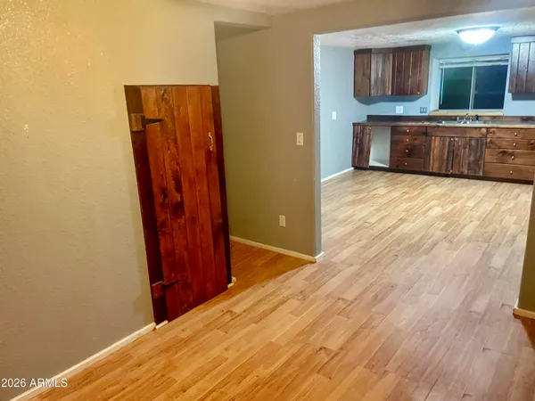 a bathroom with a sink a mirror and a shower