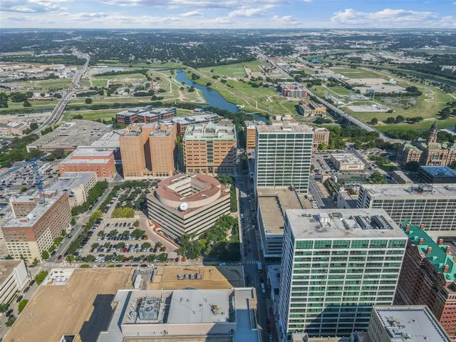 a view of a city with tall buildings