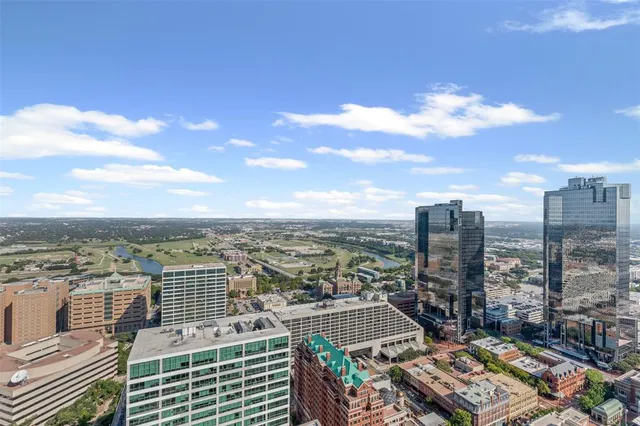 a view of a city with tall buildings