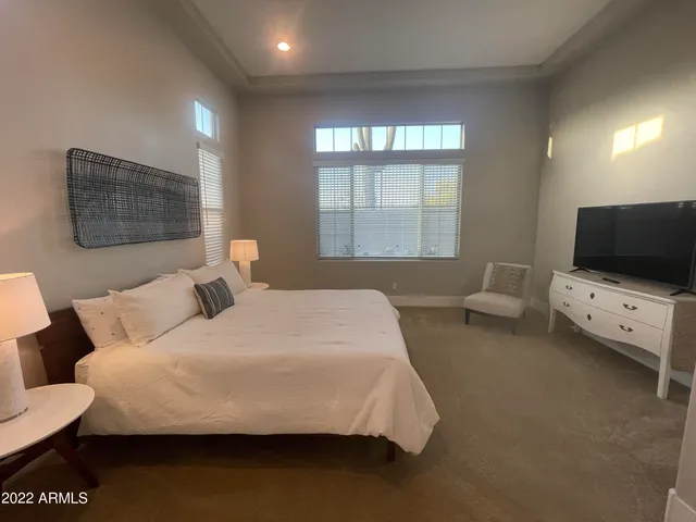 a view of balcony with furniture