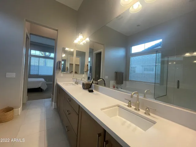 a bedroom with a bed and closet