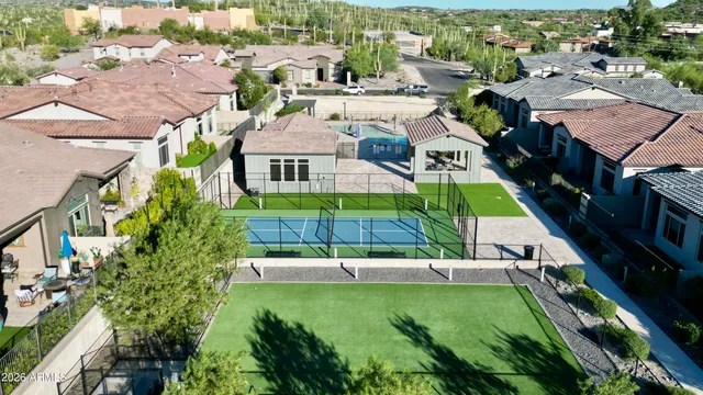an aerial view of a house with a garden