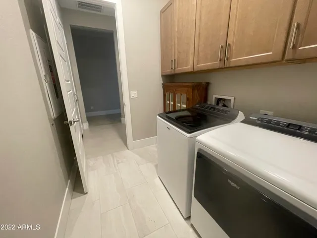 a view of a kitchen with a sink