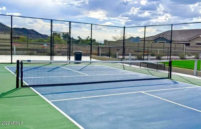 a view of backyard of a house