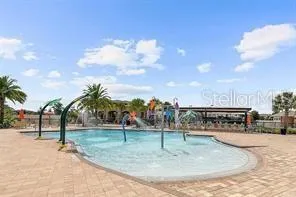 a view of a park with swings