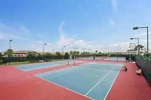 a view of an outdoor space and tennis court