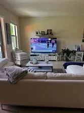 a living room with furniture and a couch