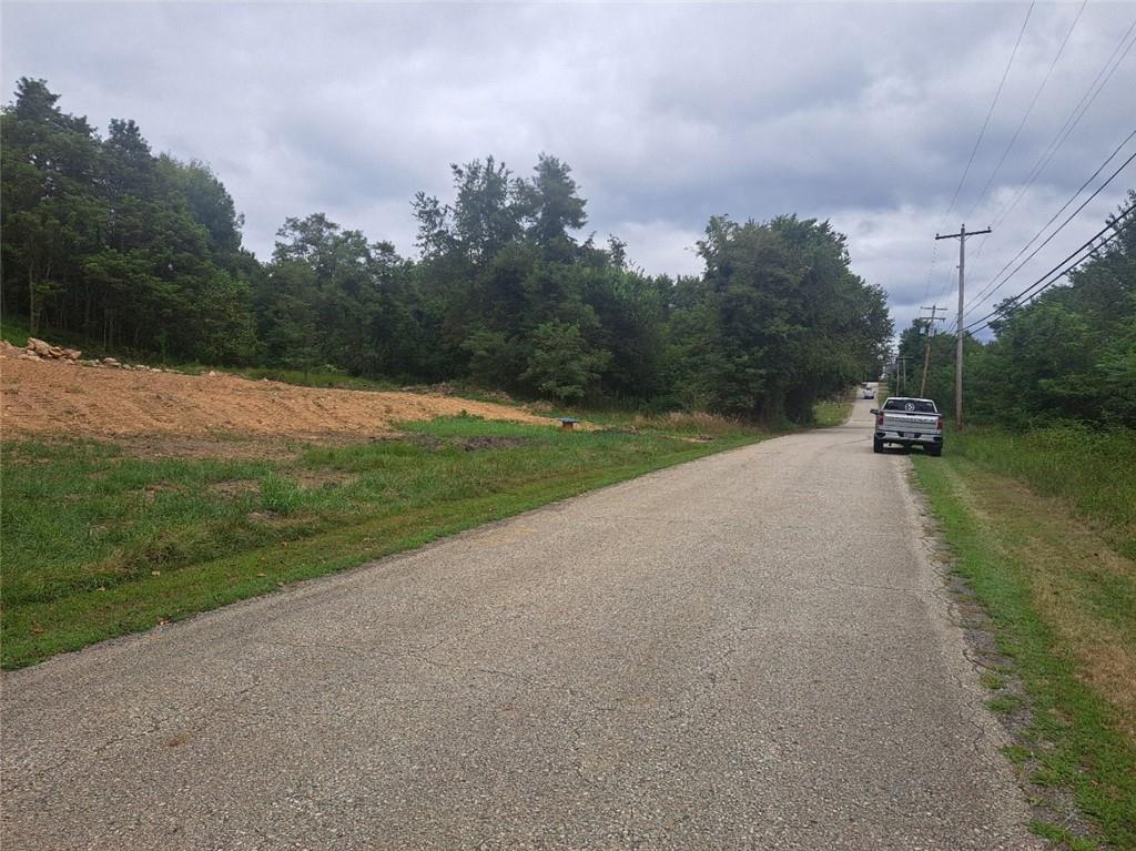 198 Church Street Star Junction, PA 15482 - Photo 2 of 4 a view of a field with trees in the background