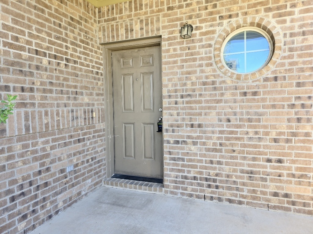 809 Yabers Court Austin, TX 78725 - Photo 2 of 29 Entrance to property with brick siding