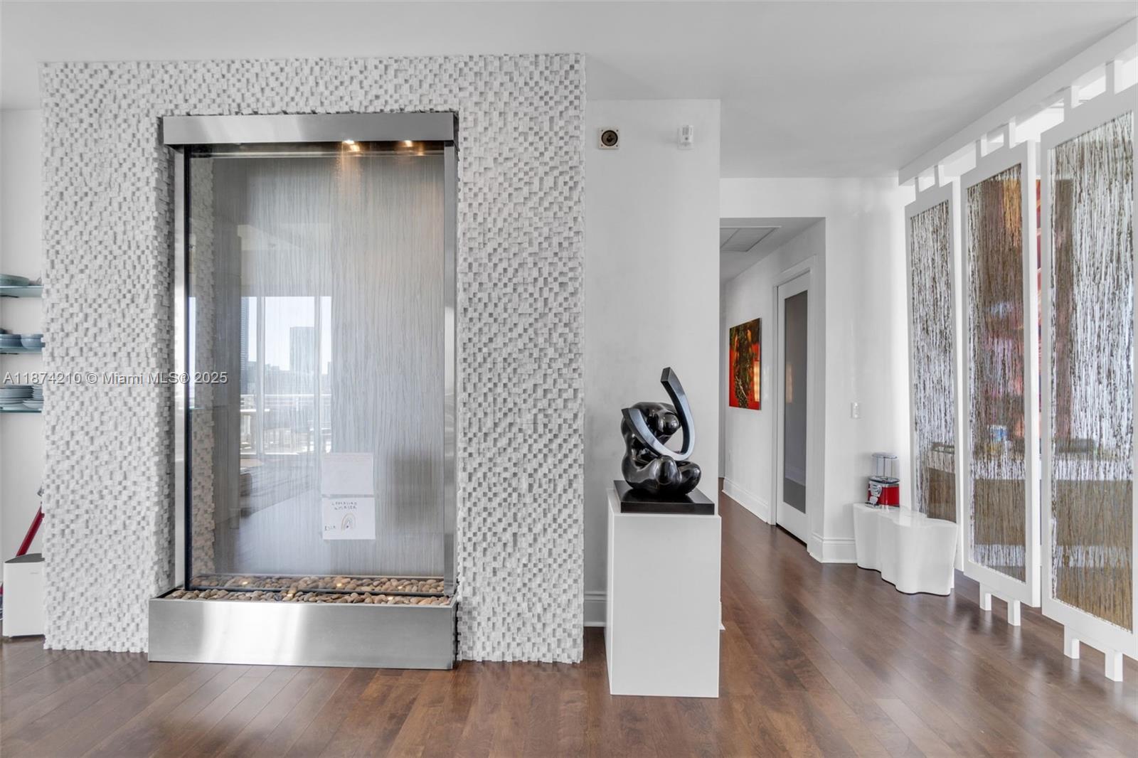 900 Brickell Key Boulevard, Unit 2904 Miami, FL 33131 - Photo 12 of 21 a view of livingroom with furniture and hardwood floor